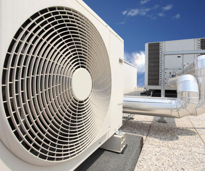 Outdoor commercial air conditioning equipment and connected ductwork