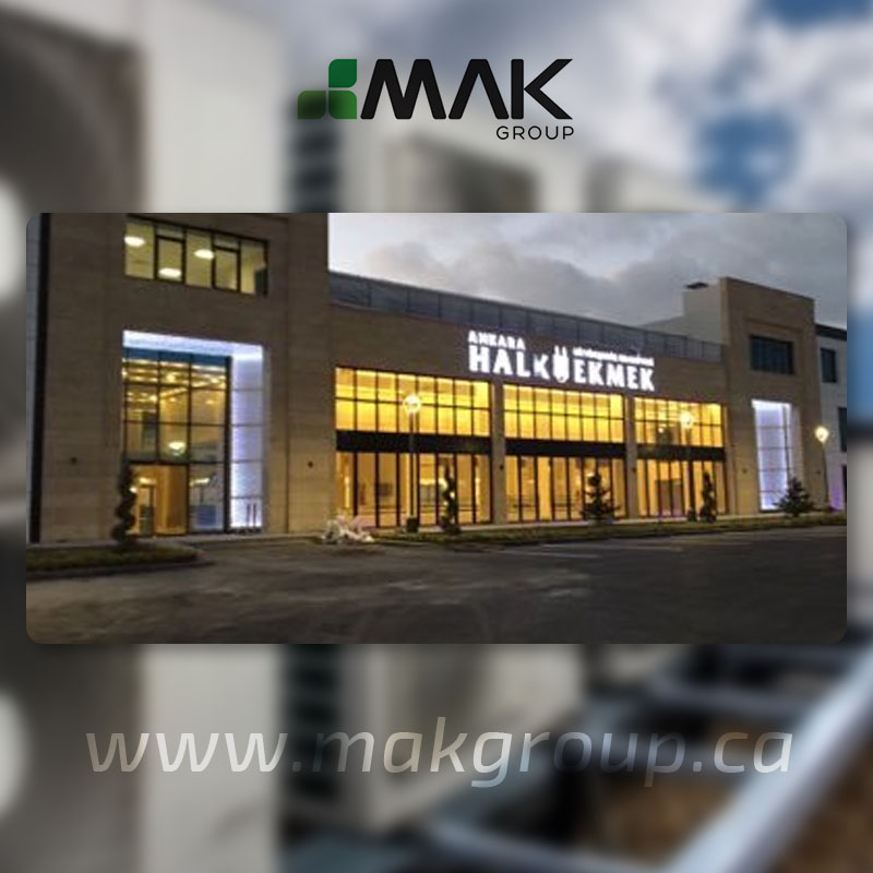 Illuminated entrance to a commercial building